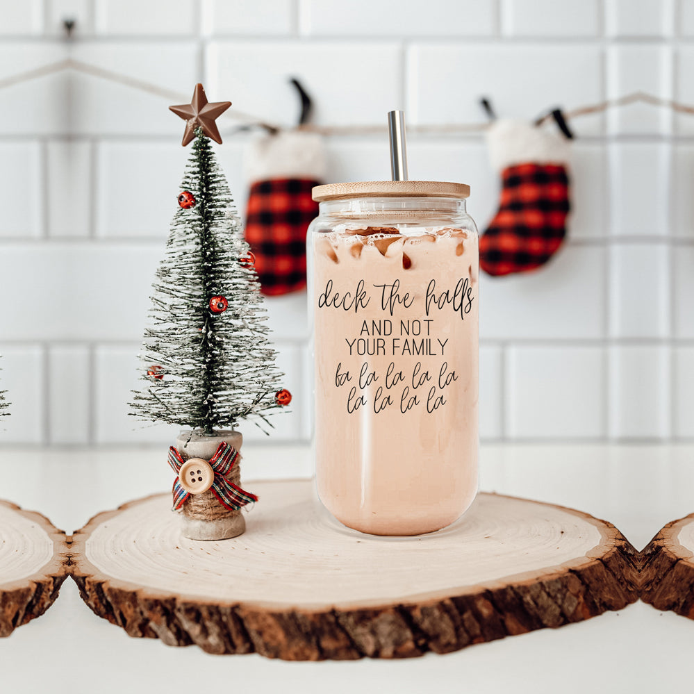 Deck the Halls Cup with bamboo lid and stainless steel straws, showcasing a modern design suitable for various beverages.