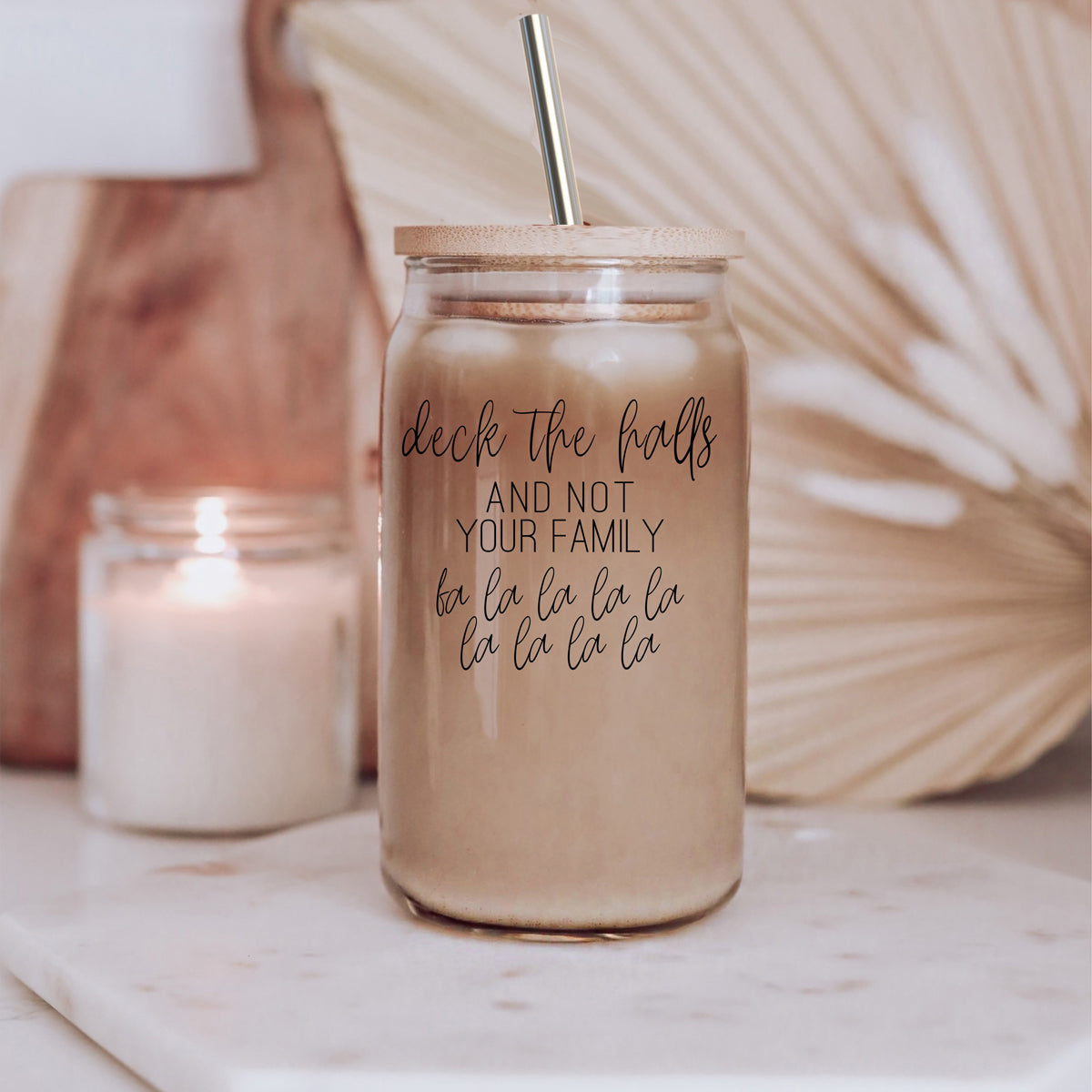 Deck the Halls Cup with bamboo lid and stainless steel straws, showcasing a modern design suitable for various beverages.