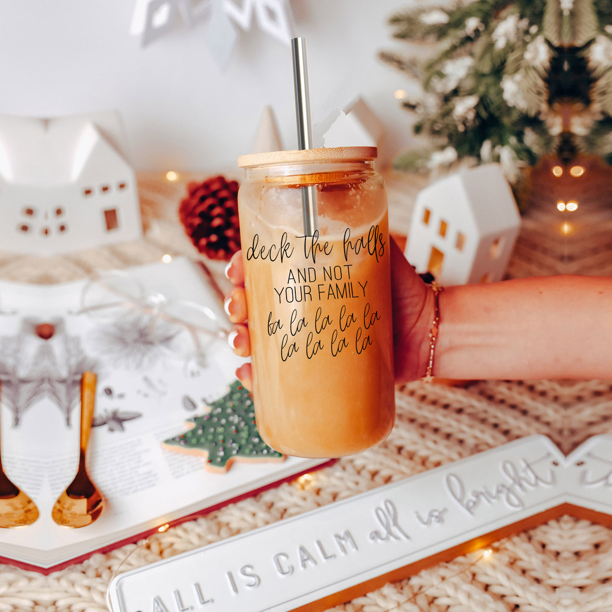 Deck the Halls Cup with bamboo lid and stainless steel straws, showcasing a modern design suitable for various beverages.