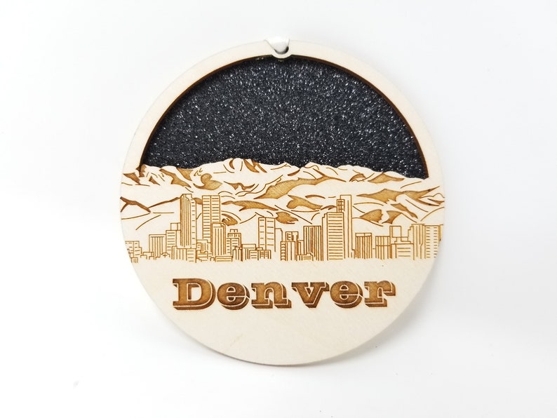 Denver Skyline Ornament made from premium Baltic birch wood, showcasing the iconic city skyline design.