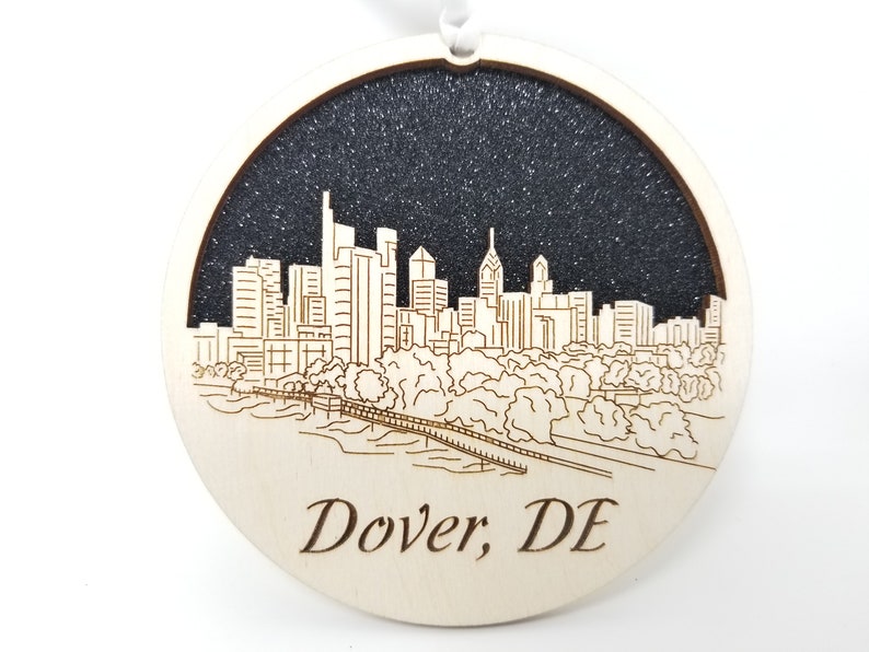 Dover Skyline Ornament made from premium Baltic birch wood, showcasing intricate city skyline design.