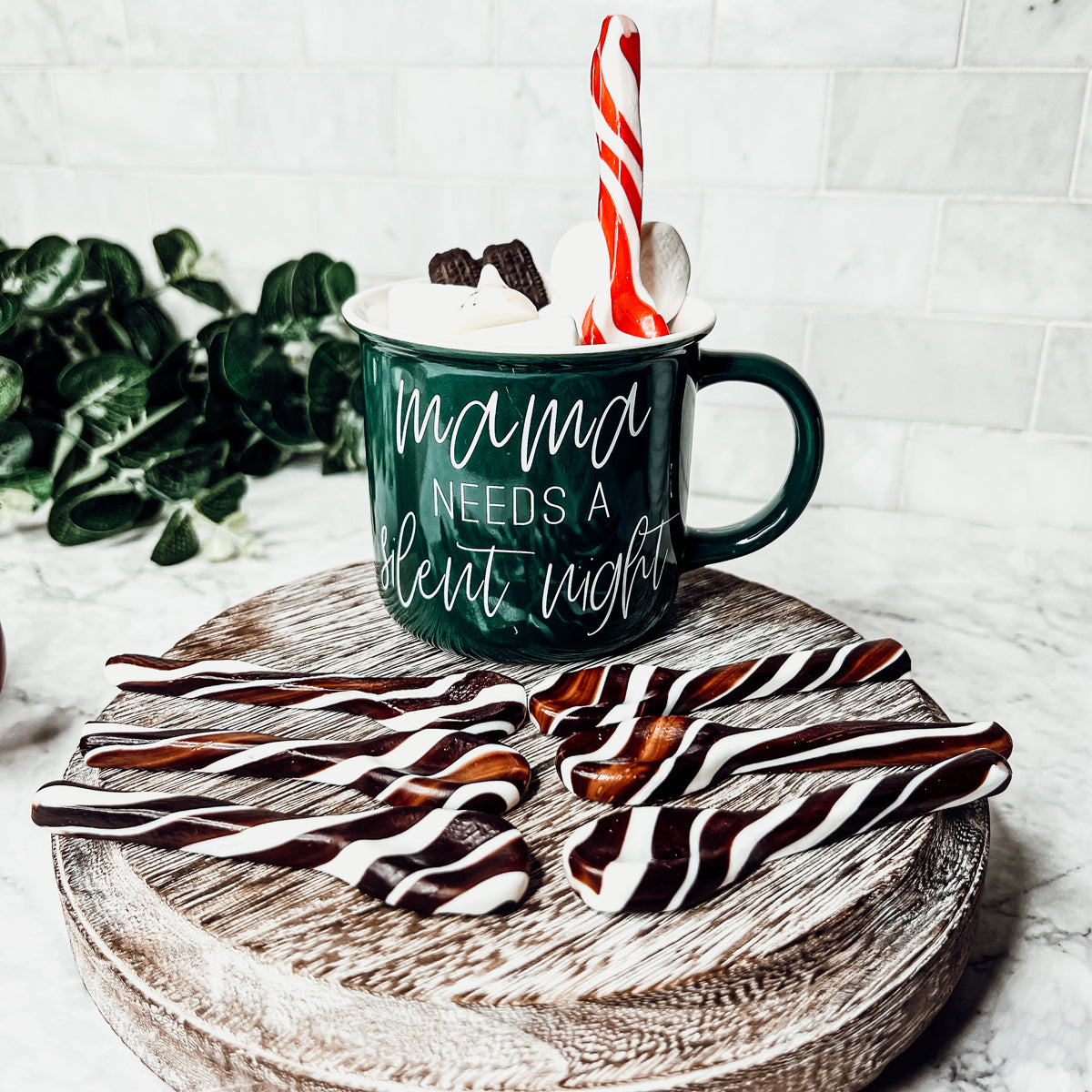 A colorful assortment of edible spoons in three flavors: Peppermint Twist, Cinnamon, and Hot Cocoa Twist, beautifully packaged in a gift box.