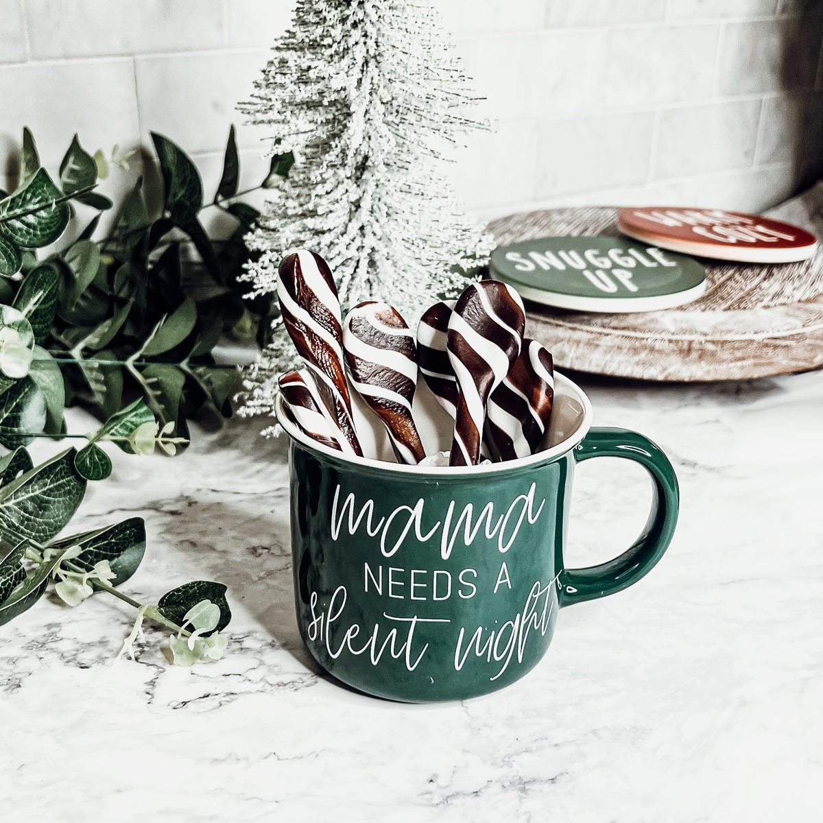 A colorful assortment of edible spoons in three flavors: Peppermint Twist, Cinnamon, and Hot Cocoa Twist, beautifully packaged in a gift box.