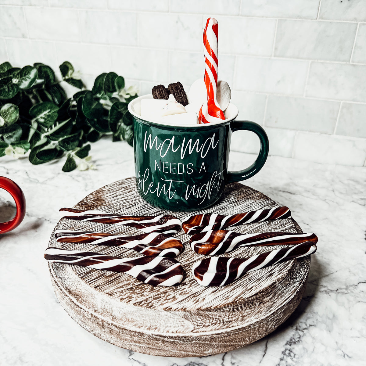 A colorful assortment of edible spoons in three flavors: Peppermint Twist, Cinnamon, and Hot Cocoa Twist, beautifully packaged in a gift box.