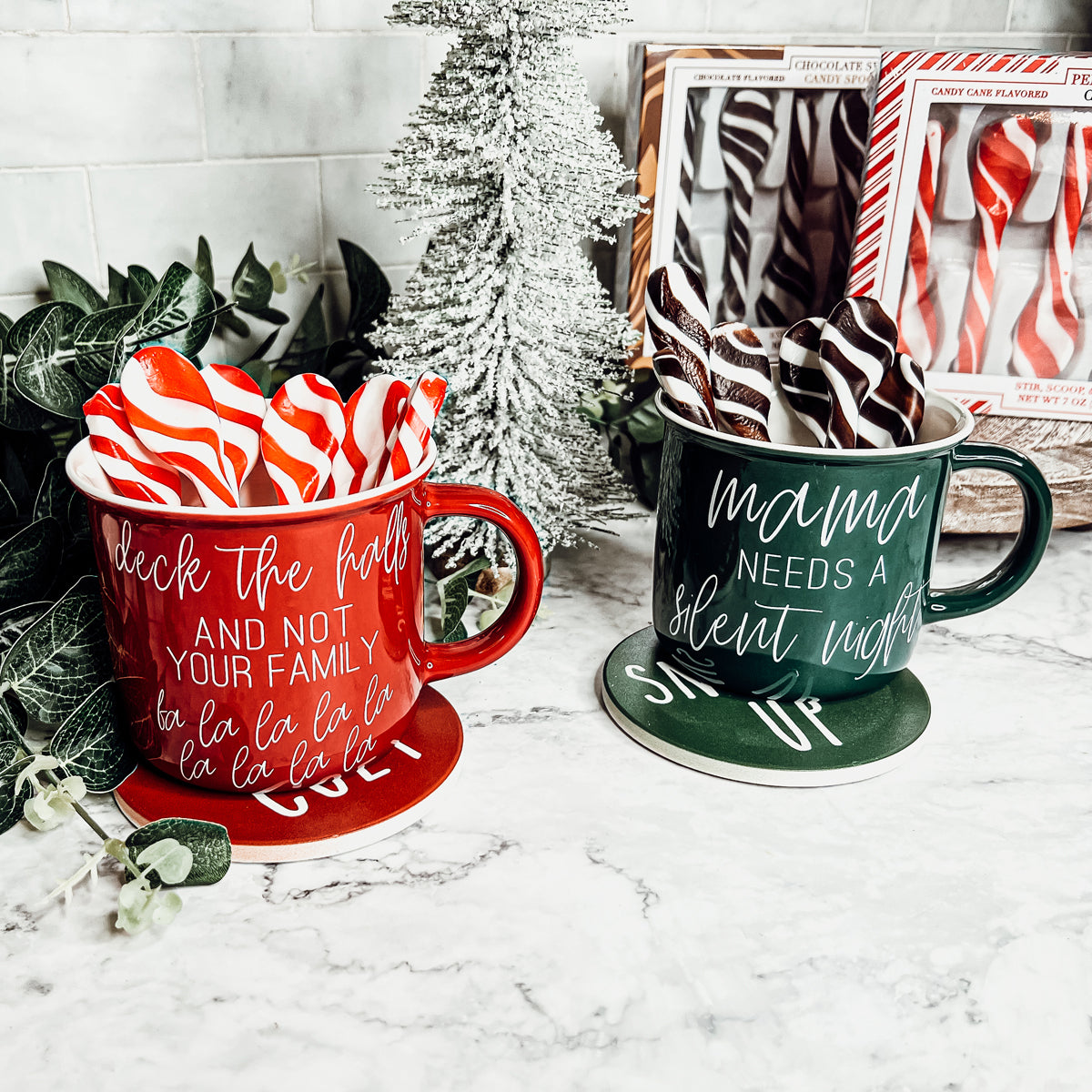 A colorful assortment of edible spoons in three flavors: Peppermint Twist, Cinnamon, and Hot Cocoa Twist, beautifully packaged in a gift box.