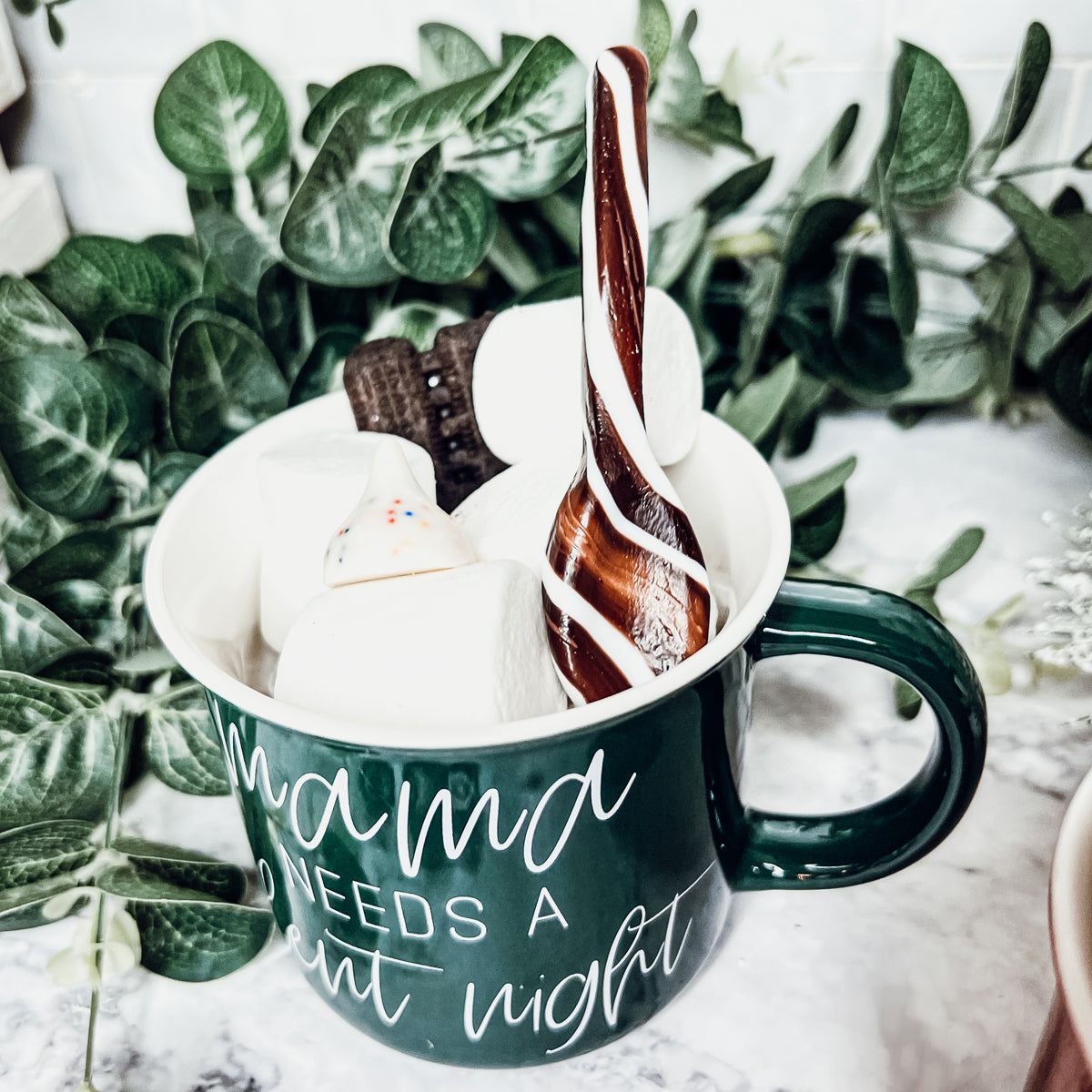 A colorful assortment of edible spoons in three flavors: Peppermint Twist, Cinnamon, and Hot Cocoa Twist, beautifully packaged in a gift box.