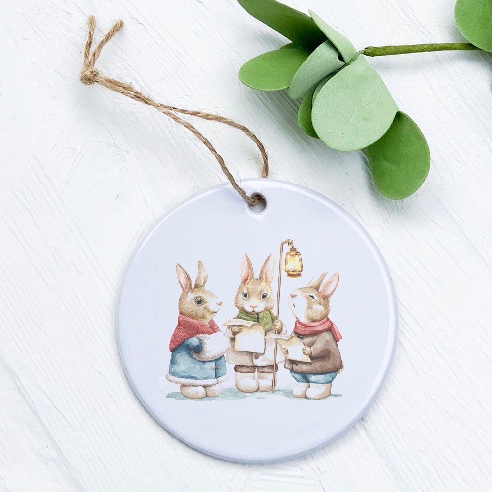 Fairytale Bunny Carolers ornament made of high-quality porcelain with a glossy finish, featuring charming bunny designs.