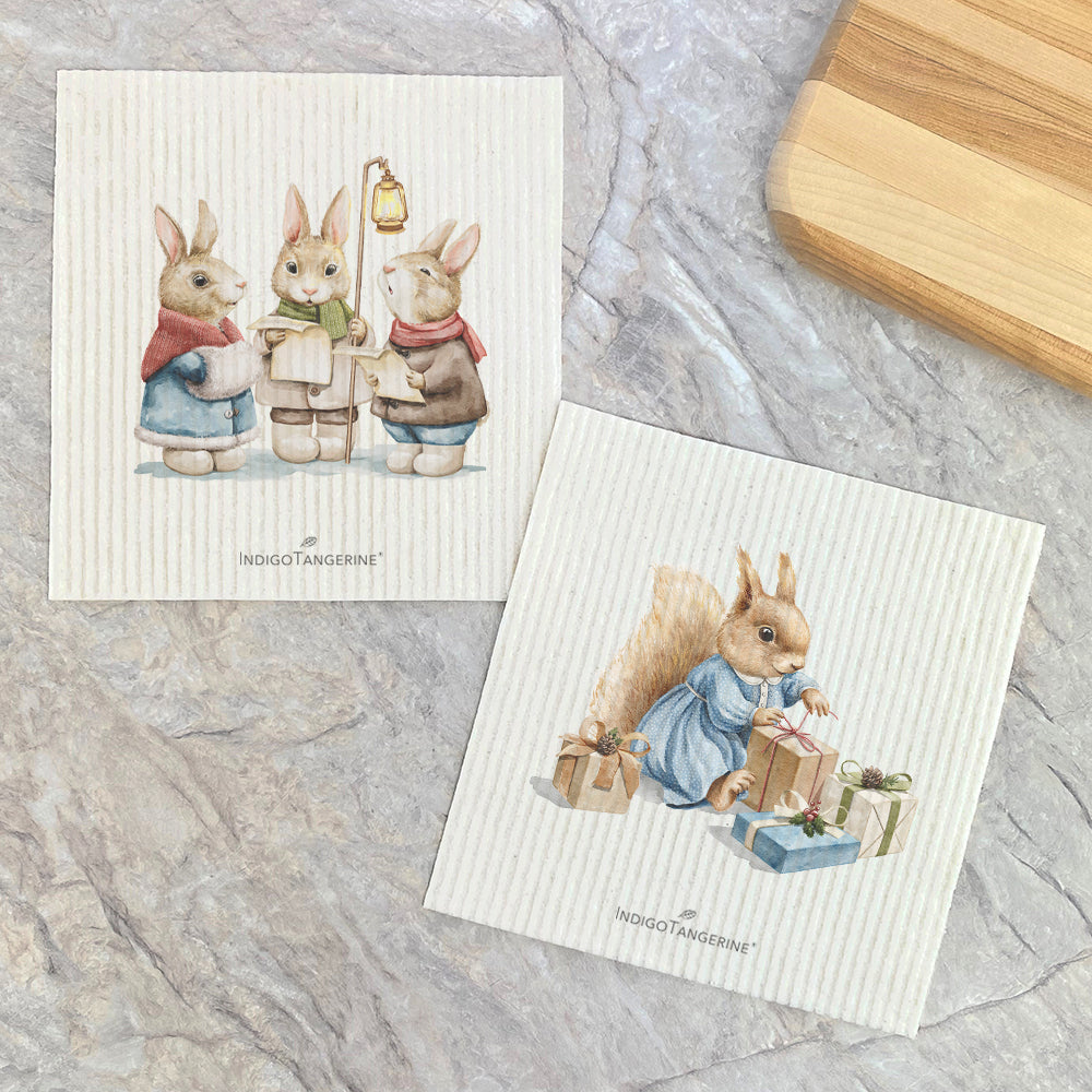 Two Swedish dishcloths featuring Fairytale Christmas Bunnies and Squirrel designs, eco-friendly and reusable.