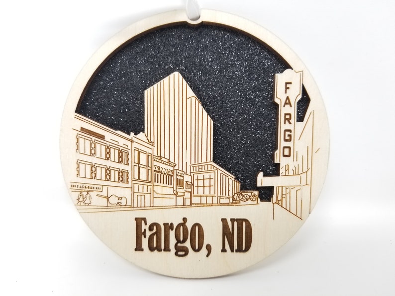 Fargo Skyline Ornament made from premium Baltic birch wood, showcasing intricate skyline design.