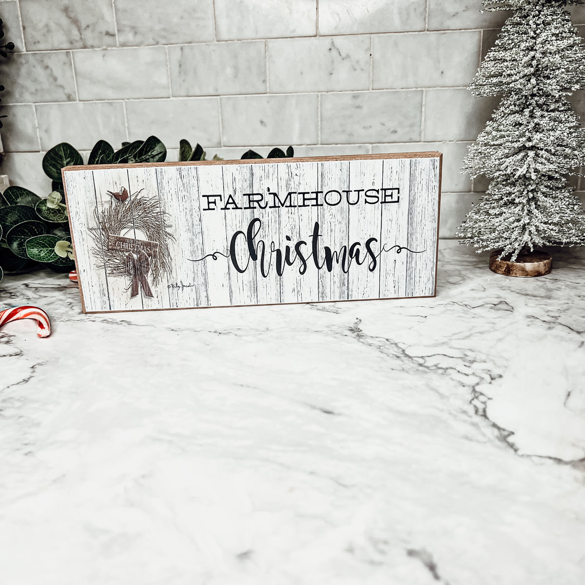 Farmhouse Christmas Sign featuring a rustic wood design, perfect for holiday decor.