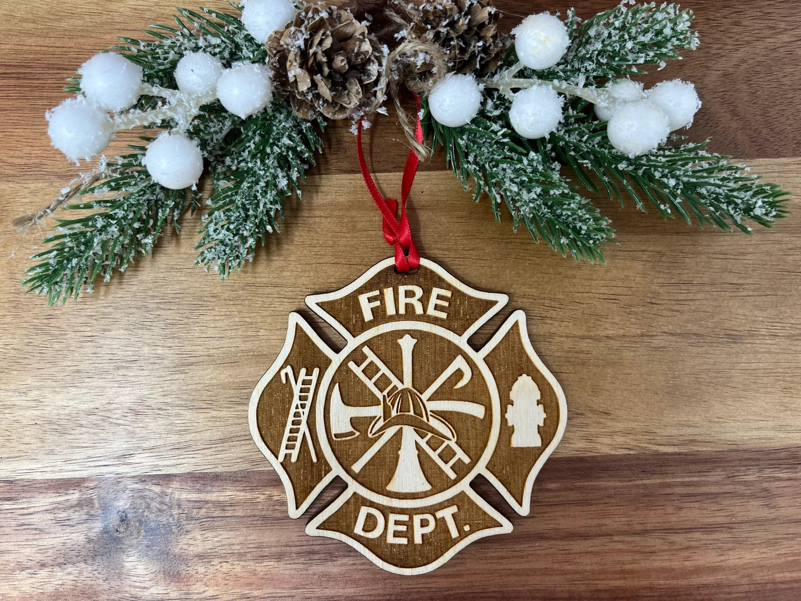 A beautifully crafted wooden ornament shaped like a firefighter, approximately 4 inches in diameter, honoring first responders.