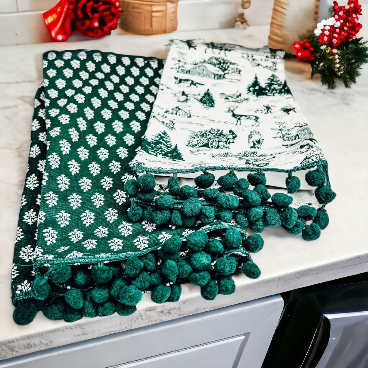 Set of two forest green dish towels with Christmas design, showcasing a classic forest pattern on durable cotton fabric.