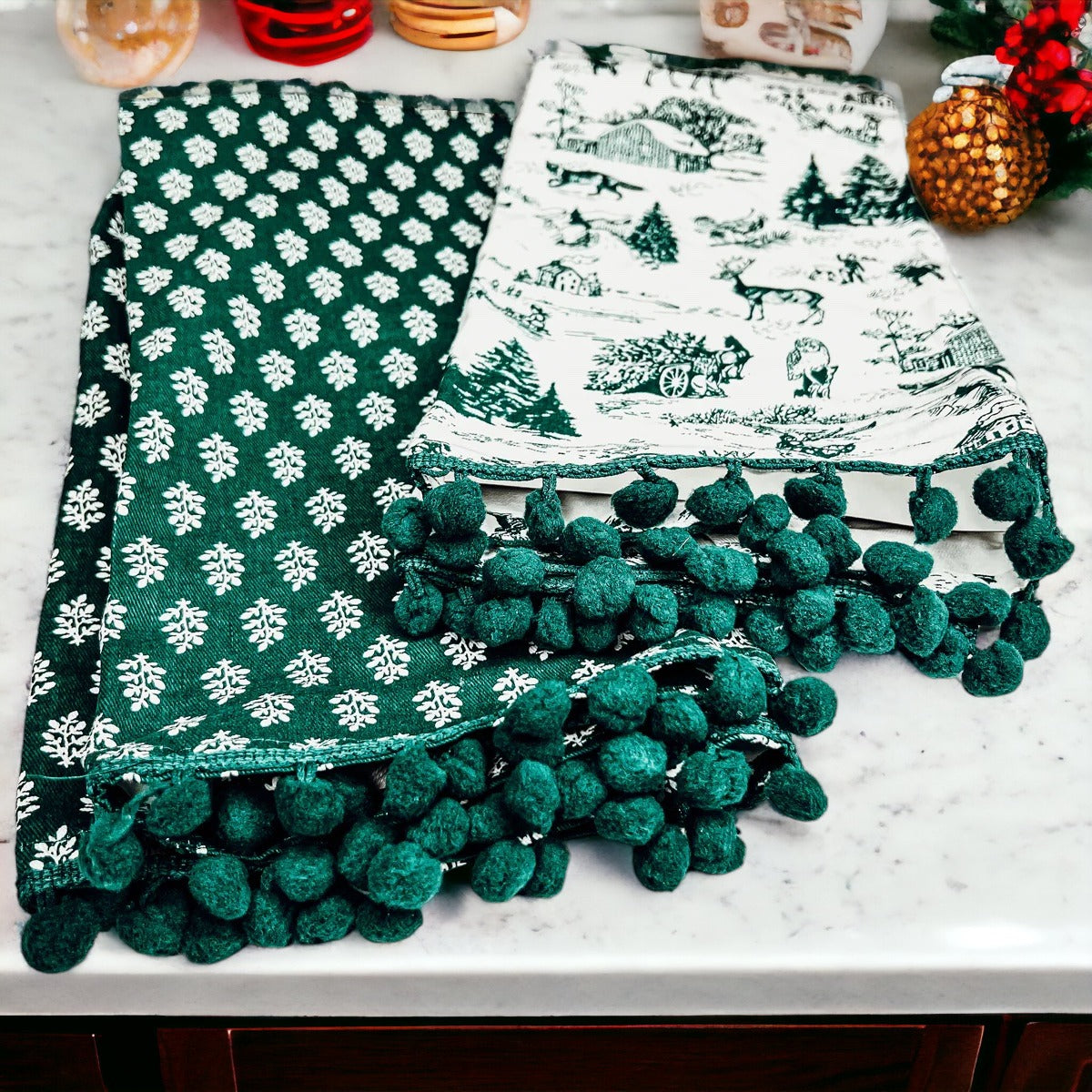 Set of two forest green dish towels with Christmas design, showcasing a classic forest pattern on durable cotton fabric.