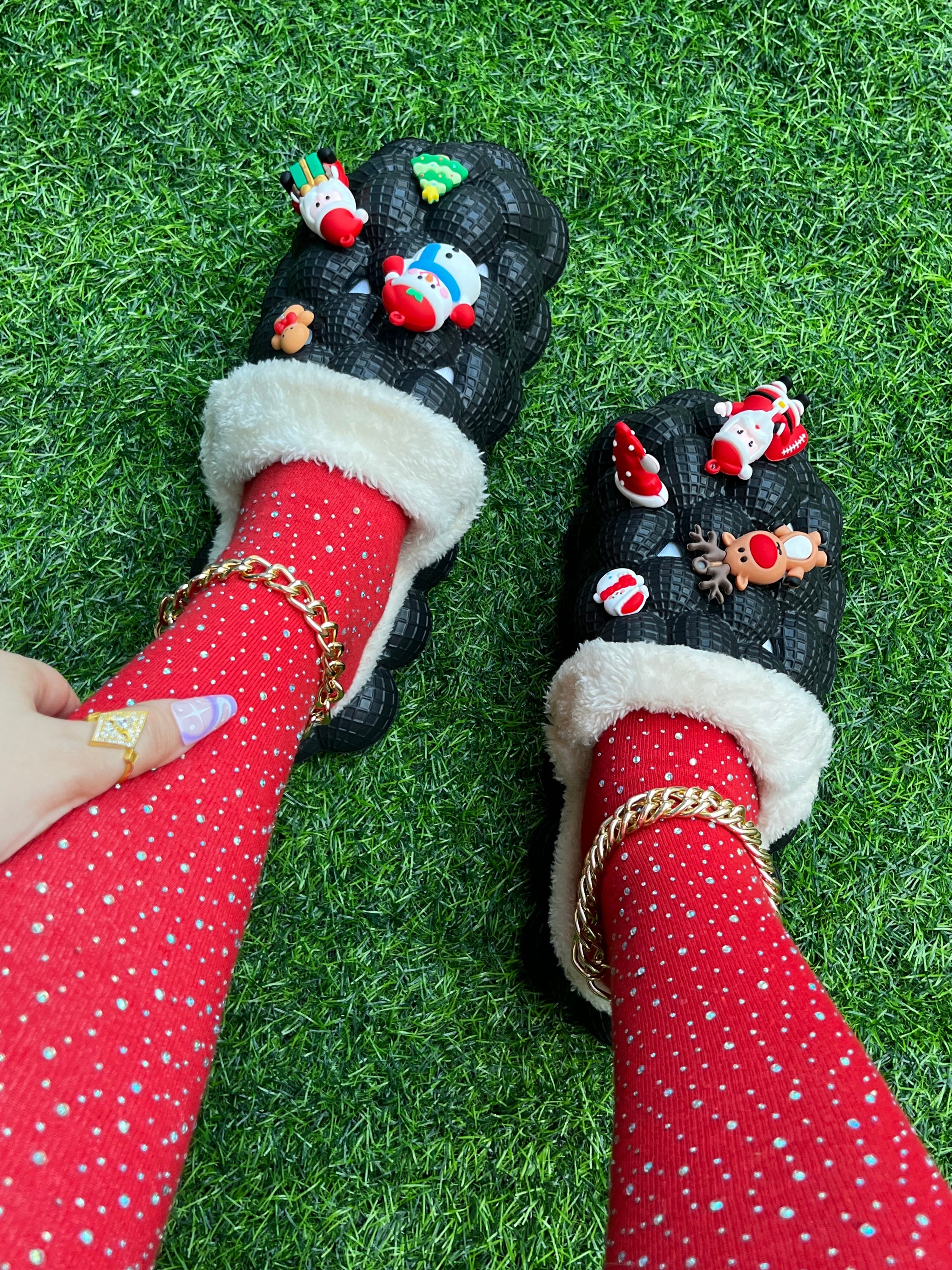 Furry House Slides in festive colors, featuring a bubble design, perfect for Christmas indoor wear.