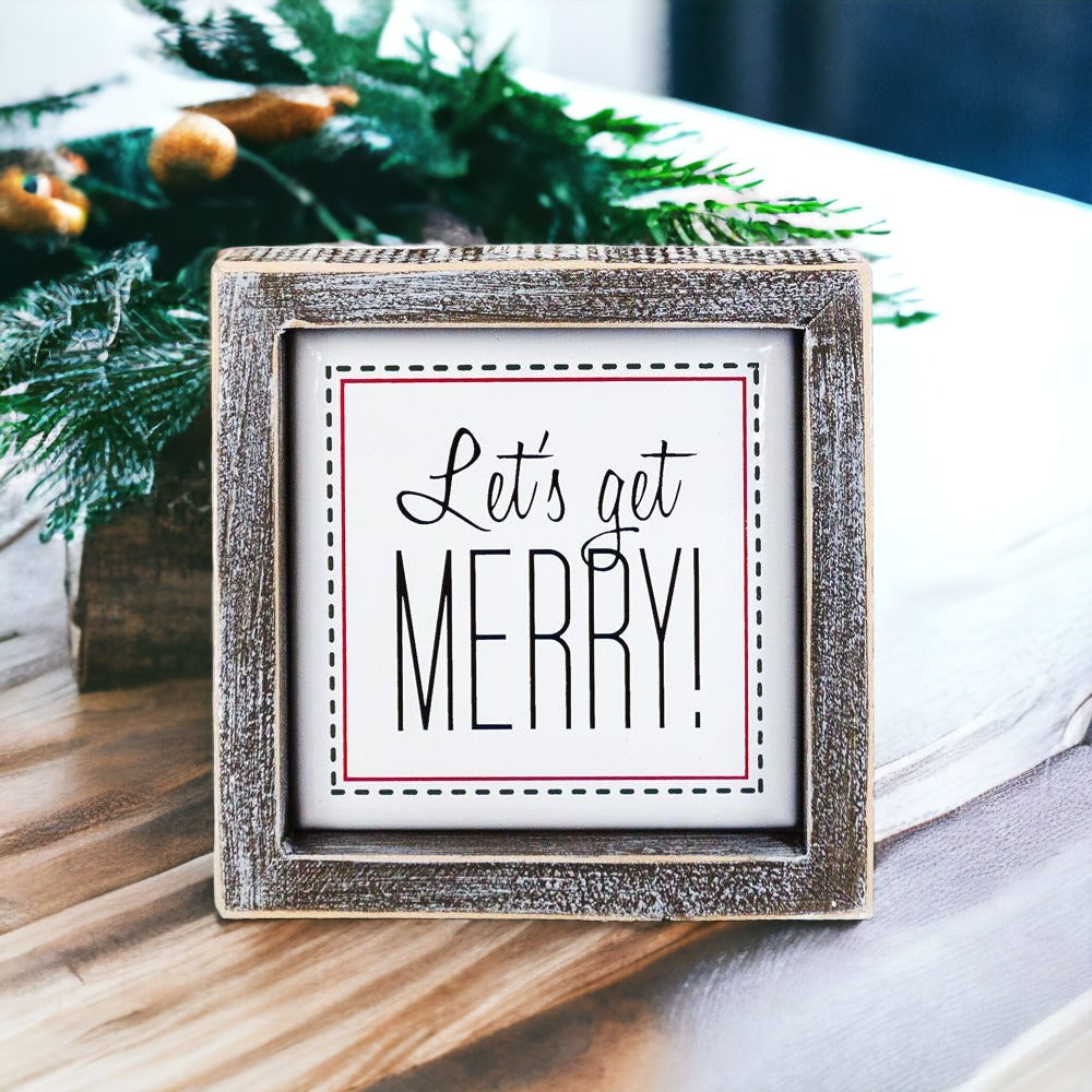 Get Merry 5" Sign featuring a wooden frame and metal embossed lettering with a red border, perfect for holiday decor.