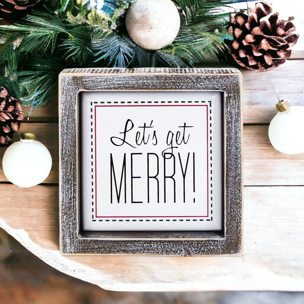 Get Merry 5" Sign featuring a wooden frame and metal embossed lettering with a red border, perfect for holiday decor.