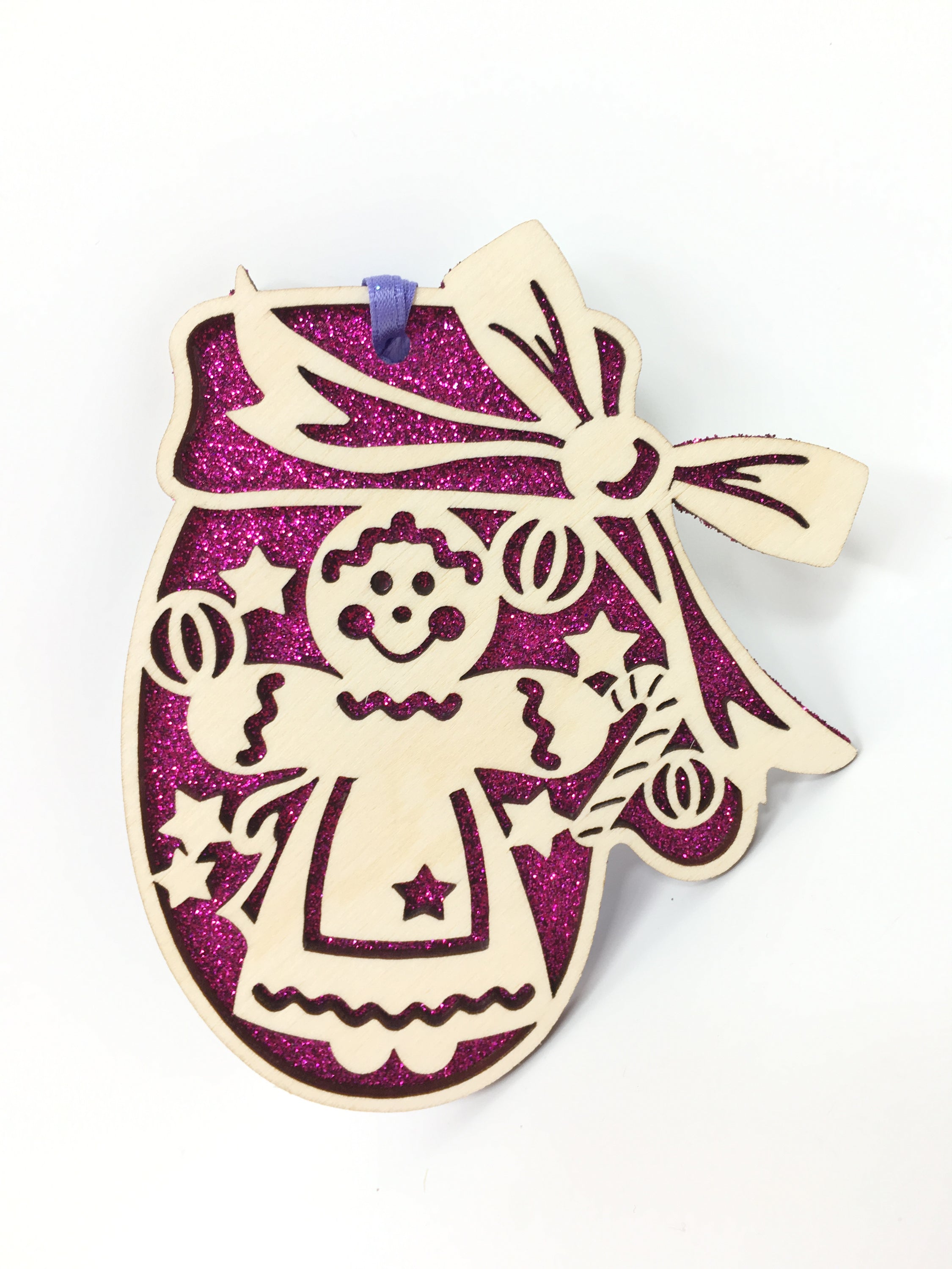 A beautifully crafted Gingerbread Mitten ornament made from premium Baltic Birch wood, featuring intricate laser-cut designs.