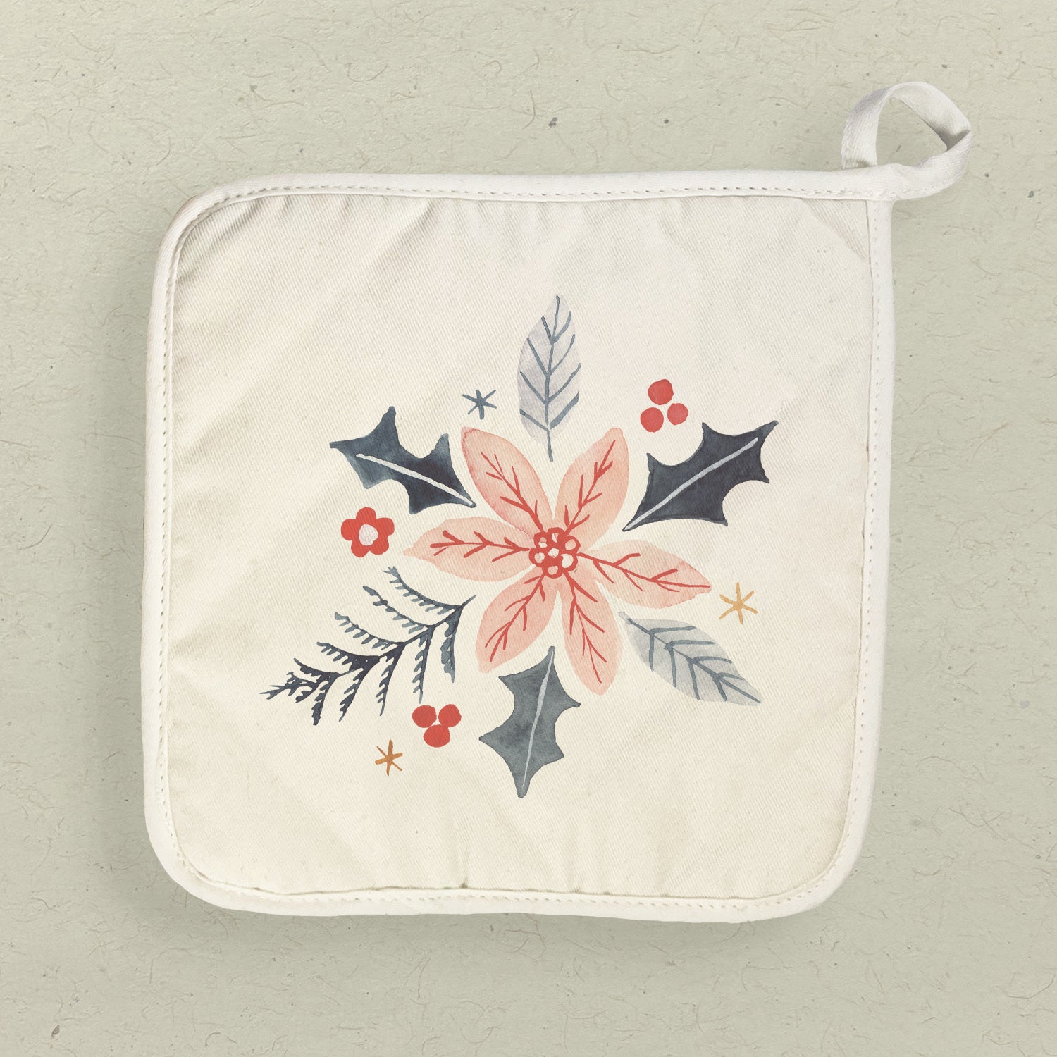 Hand drawn pink poinsettia cotton pot holder with a quilted terry cloth design, perfect for protecting surfaces from hot cookware.