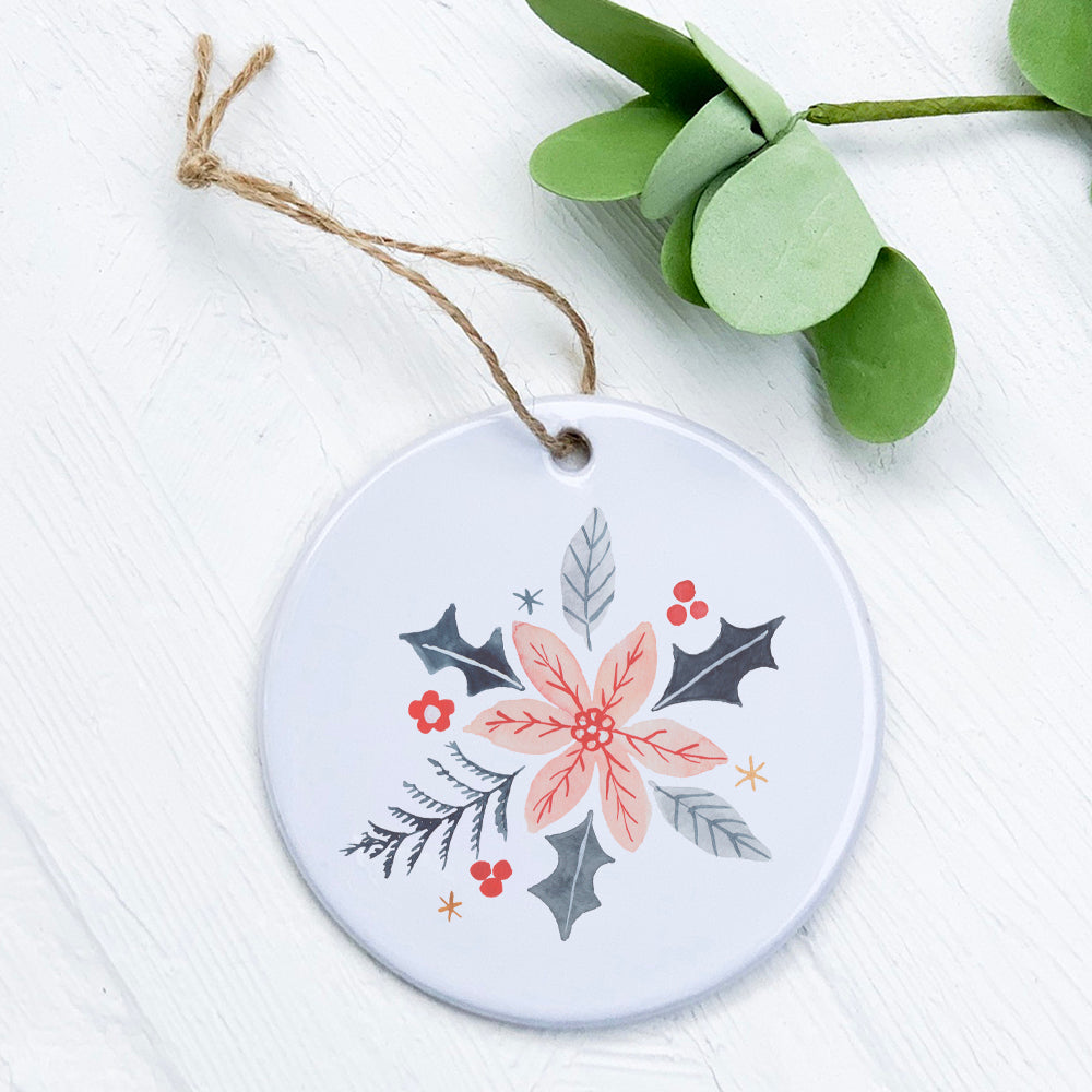 Hand Drawn Pink Poinsettia Ornament made of high-quality porcelain with a vibrant design.