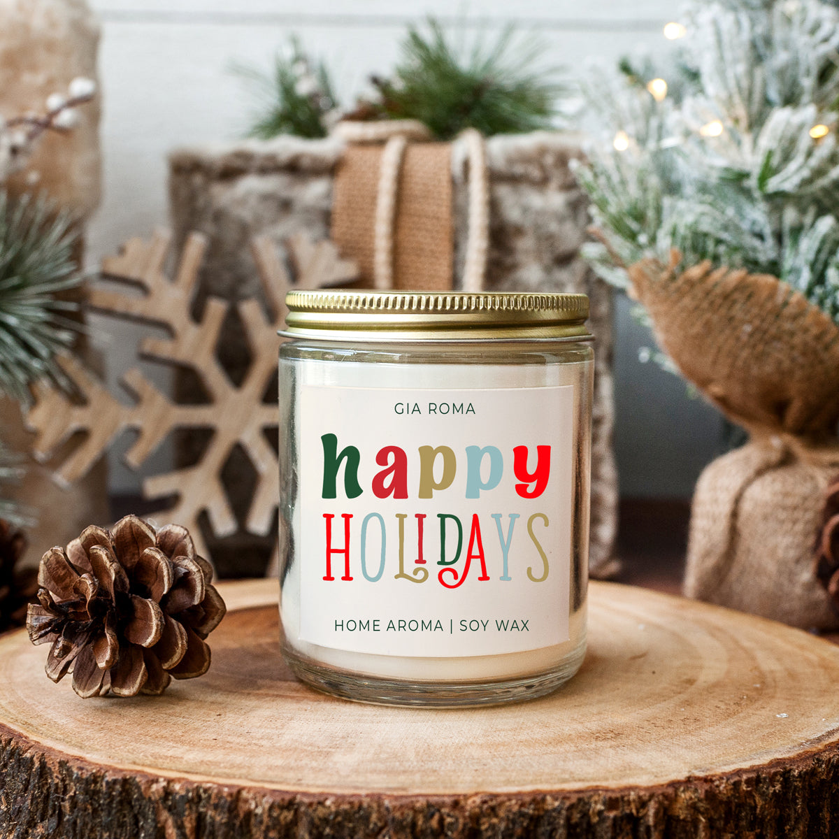 Happy Holiday Candle in a 9oz jar with festive scents of pine, orange, and woods, perfect for creating a cozy holiday atmosphere.