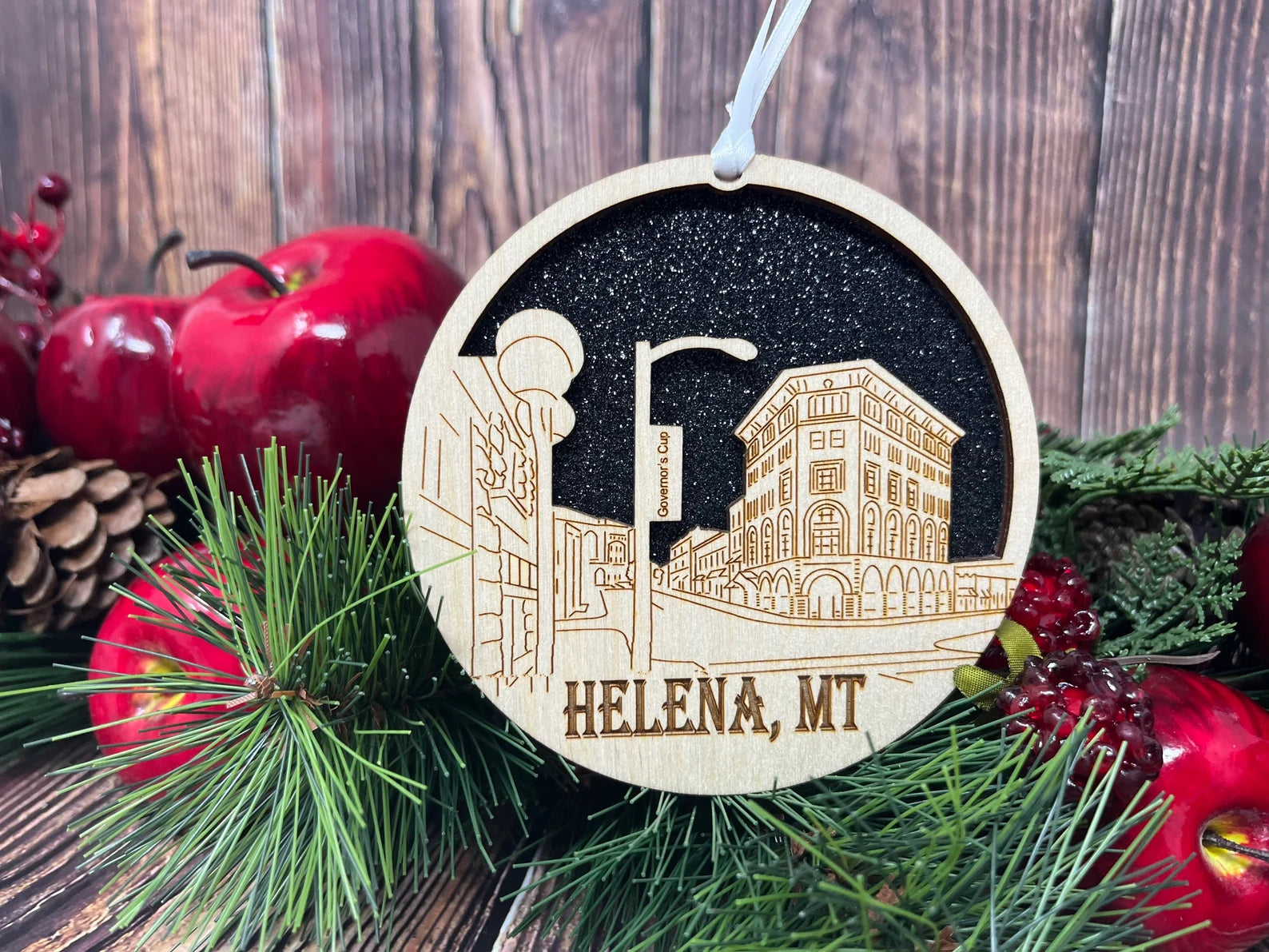 Helena Skyline Ornament made from premium Baltic birch wood, showcasing a detailed city skyline design.