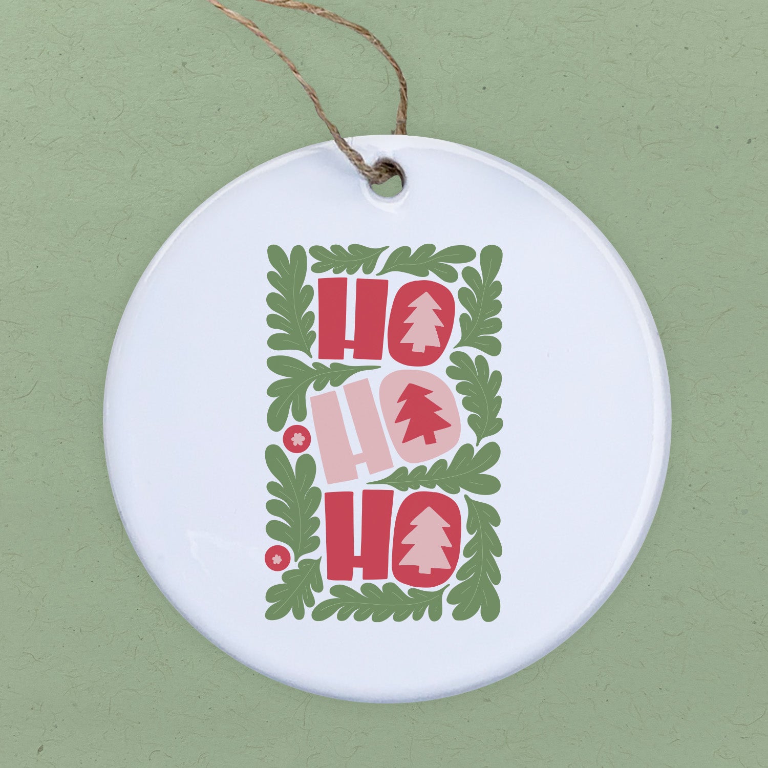 A high-quality porcelain ornament featuring the festive phrase 'Ho Ho Ho' in vibrant colors, perfect for holiday decor.