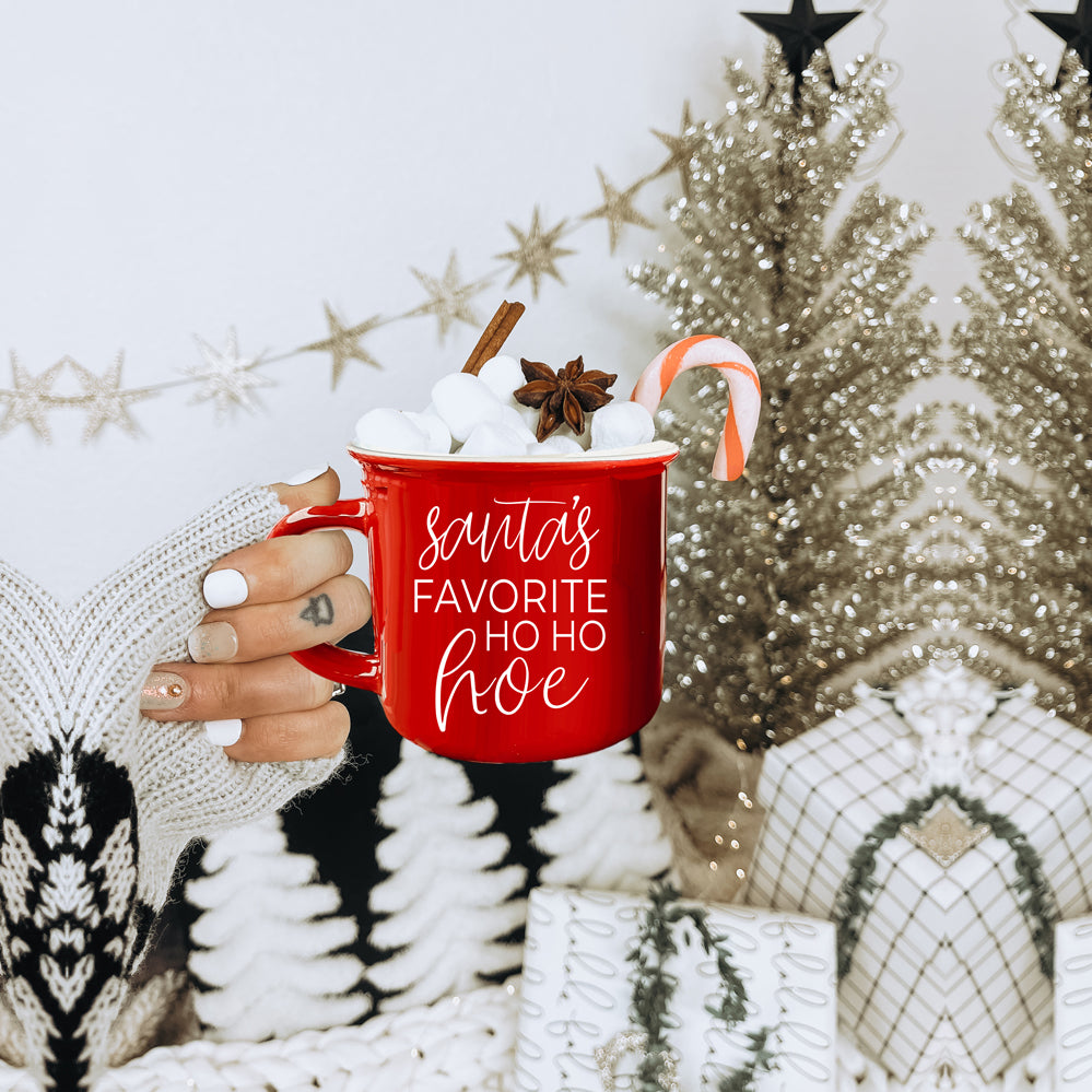 Festive Ho Ho Hoe Mug in red and green ceramic with white lettering, perfect for holiday beverages.