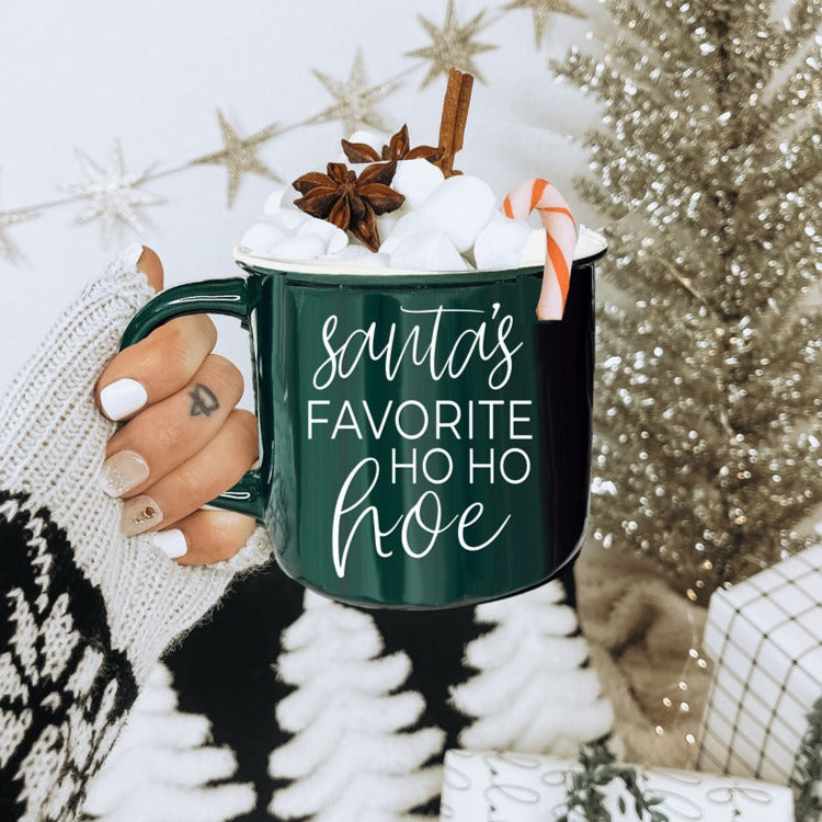 Festive Ho Ho Hoe Mug in red and green ceramic with white lettering, perfect for holiday beverages.