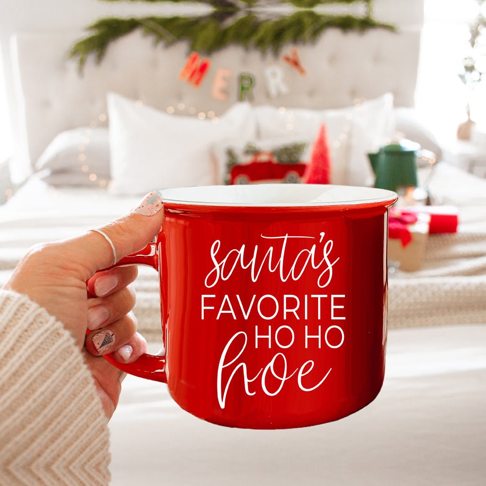 Festive Ho Ho Hoe Mug in red and green ceramic with white lettering, perfect for holiday beverages.