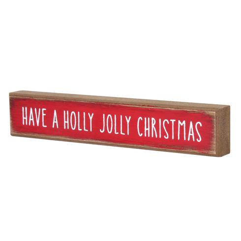 Holly Jolly Sitter Sign, a wooden block sign with festive lettering, perfect for holiday decor.