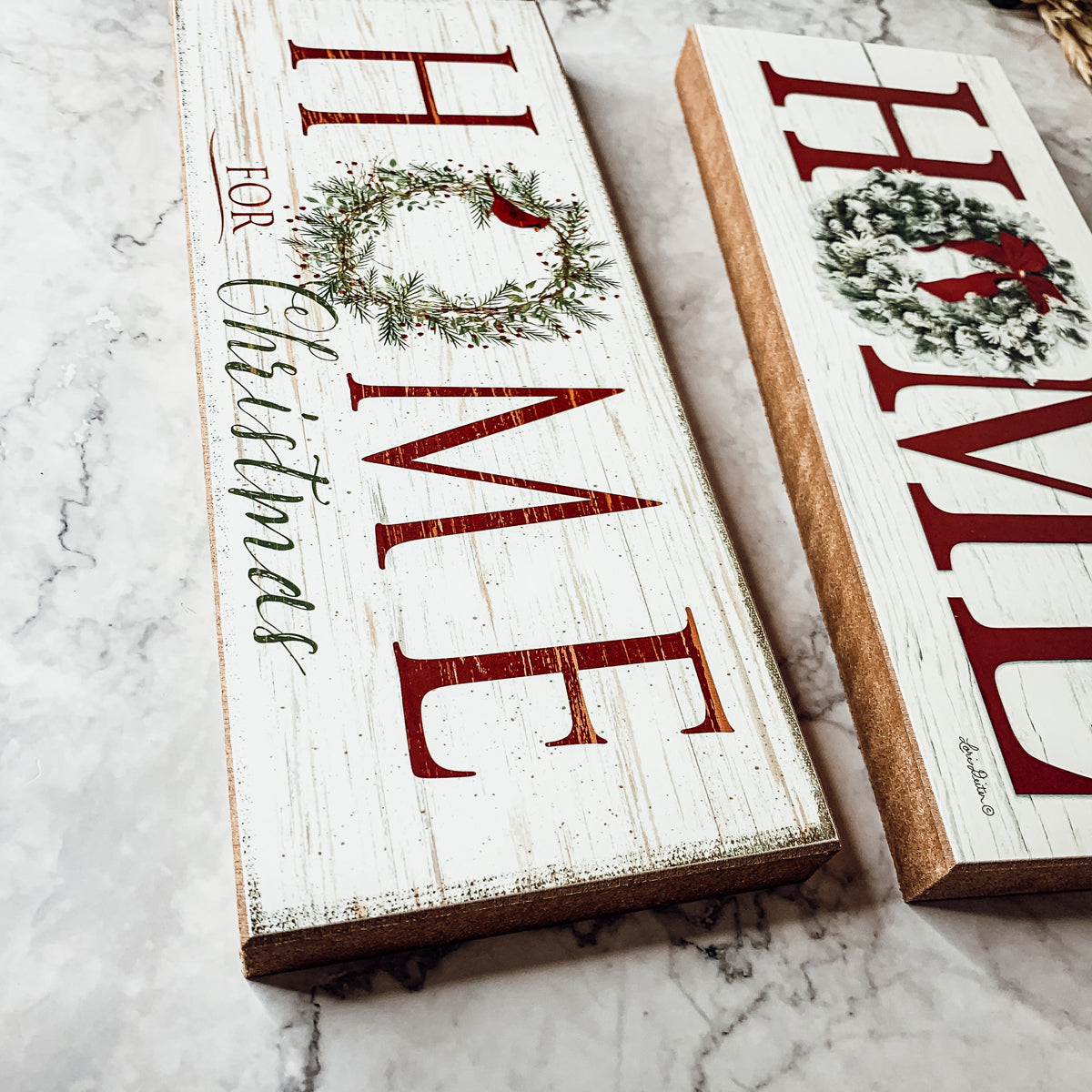 A beautifully crafted Home for Christmas Sign made of thick wood, featuring a festive wreath design on the letter 'O'.