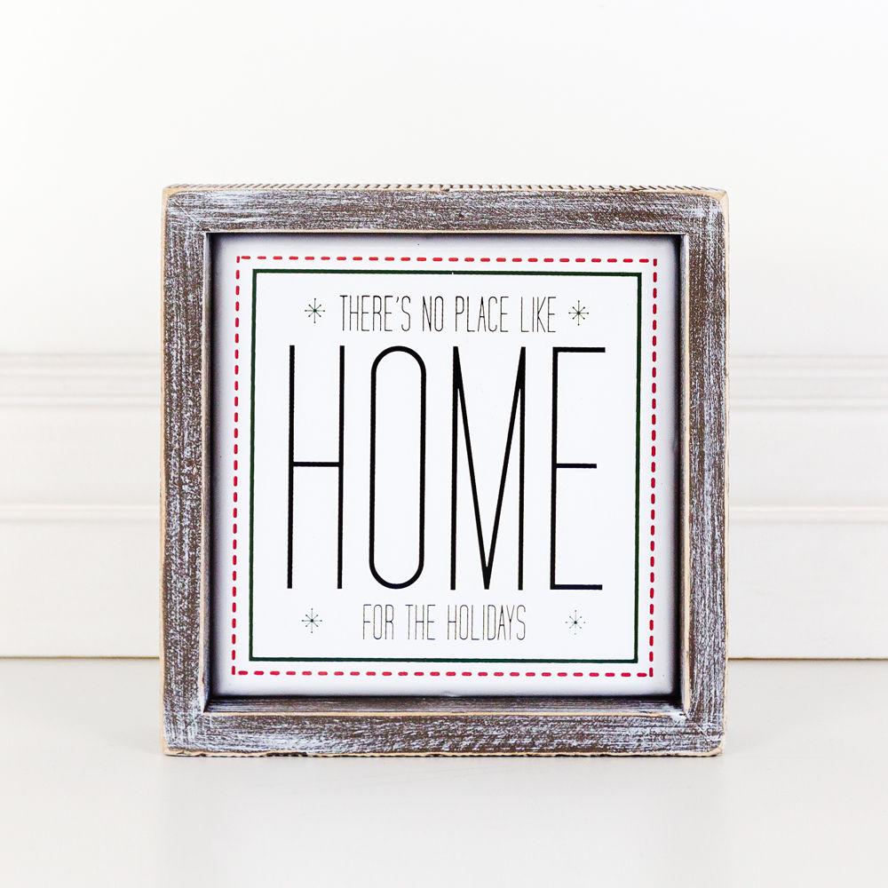 A stylish 7-inch framed sign that reads 'There's No Place Like Home for the Holidays' with a wooden frame and metal accents.