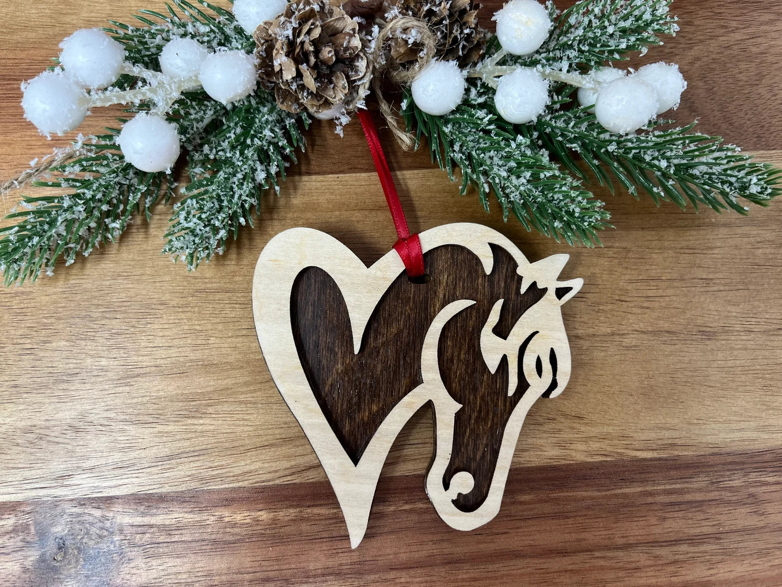 A beautifully crafted Horse Heart Ornament made from premium Baltic Birch wood, featuring intricate laser-cut details.