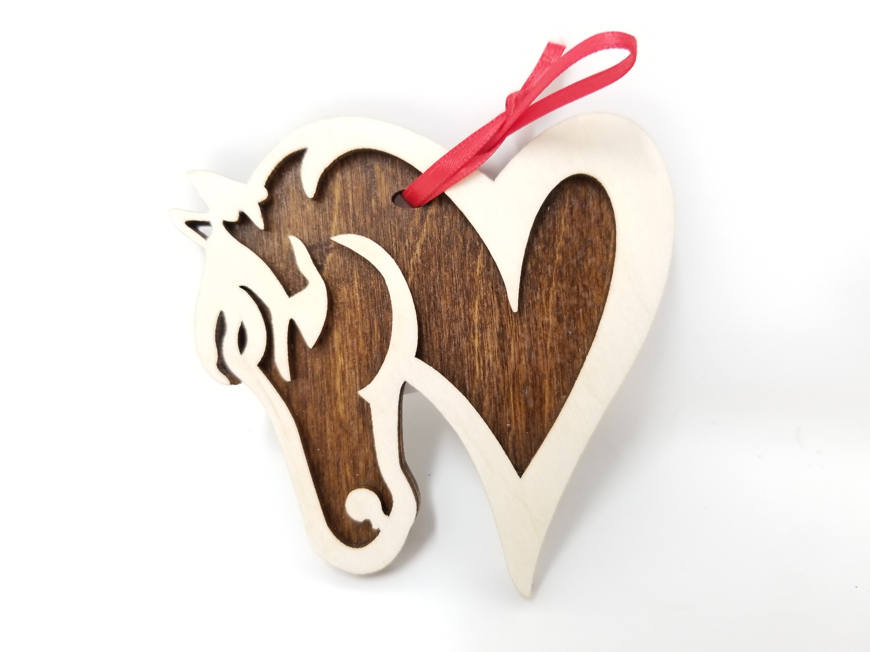 A beautifully crafted Horse Heart Ornament made from premium Baltic Birch wood, featuring intricate laser-cut details.