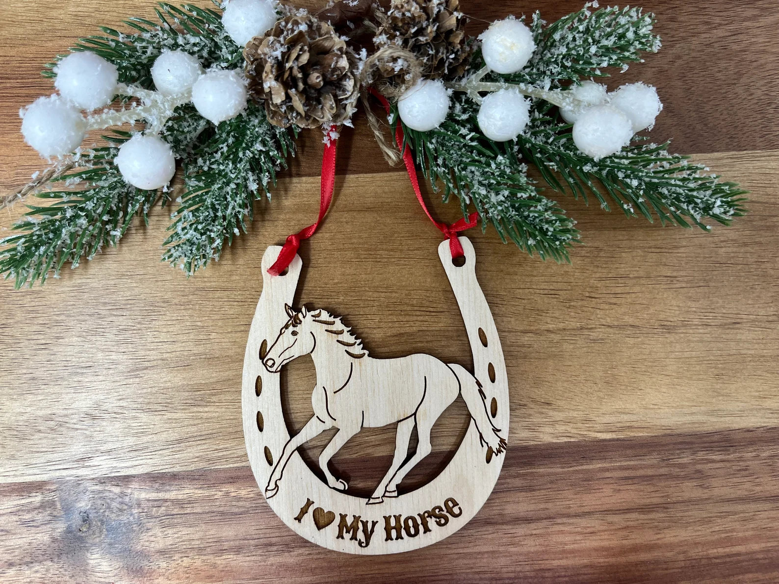 A beautifully crafted Horse Shoe ornament made from premium Baltic Birch wood, featuring intricate laser-cut details.