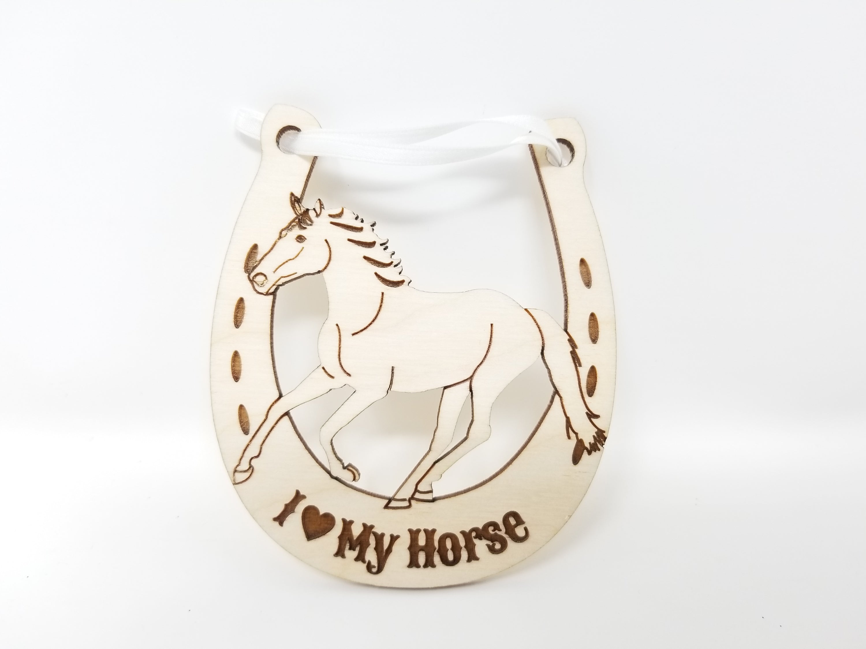 A beautifully crafted Horse Shoe ornament made from premium Baltic Birch wood, featuring intricate laser-cut details.