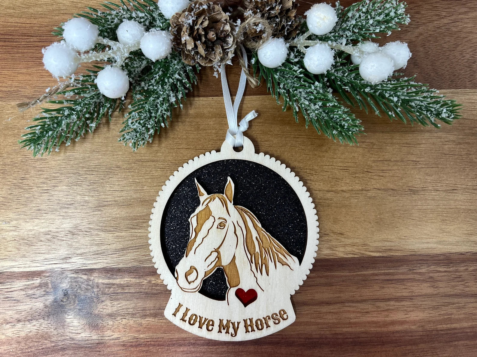 A beautifully crafted wooden ornament featuring a horse design, made from premium Baltic Birch wood, perfect for holiday decorations.