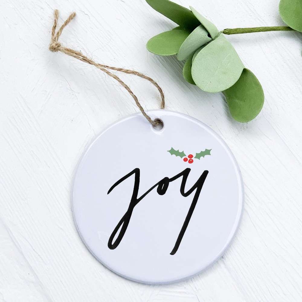 Joy Ornament made of high-quality porcelain with vibrant design, perfect for gifting or home decoration.