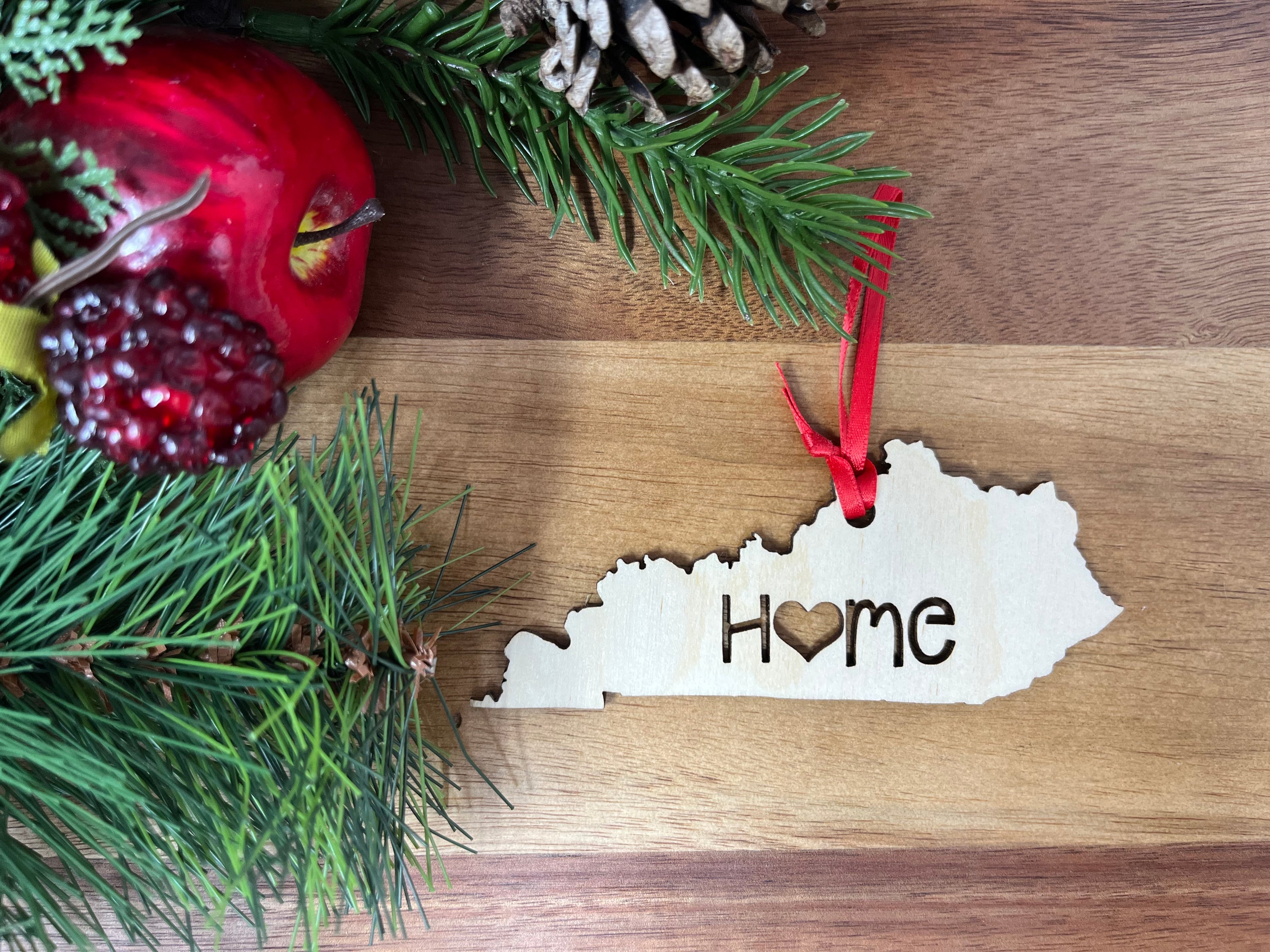 Kentucky State Wood Christmas Ornament made from Baltic Birch, showcasing the outline of Kentucky with a rustic finish.