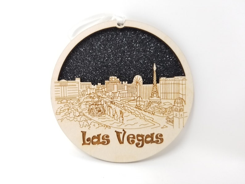 Las Vegas Skyline Ornament made from premium Baltic birch wood, showcasing intricate skyline details.