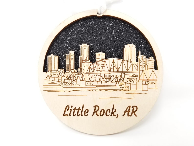 Little Rock Skyline Ornament made from premium Baltic birch wood, showcasing the city's iconic skyline design.