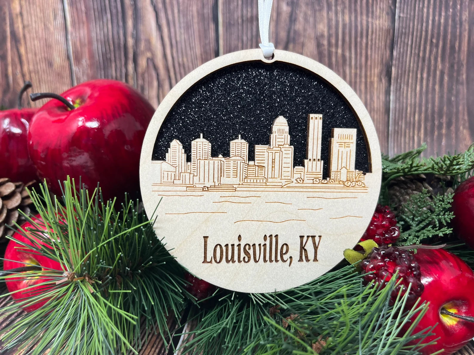 Louisville Skyline Ornament made from premium Baltic birch wood, showcasing the city's iconic skyline in a beautiful design.