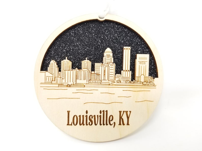 Louisville Skyline Ornament made from premium Baltic birch wood, showcasing the city's iconic skyline in a beautiful design.