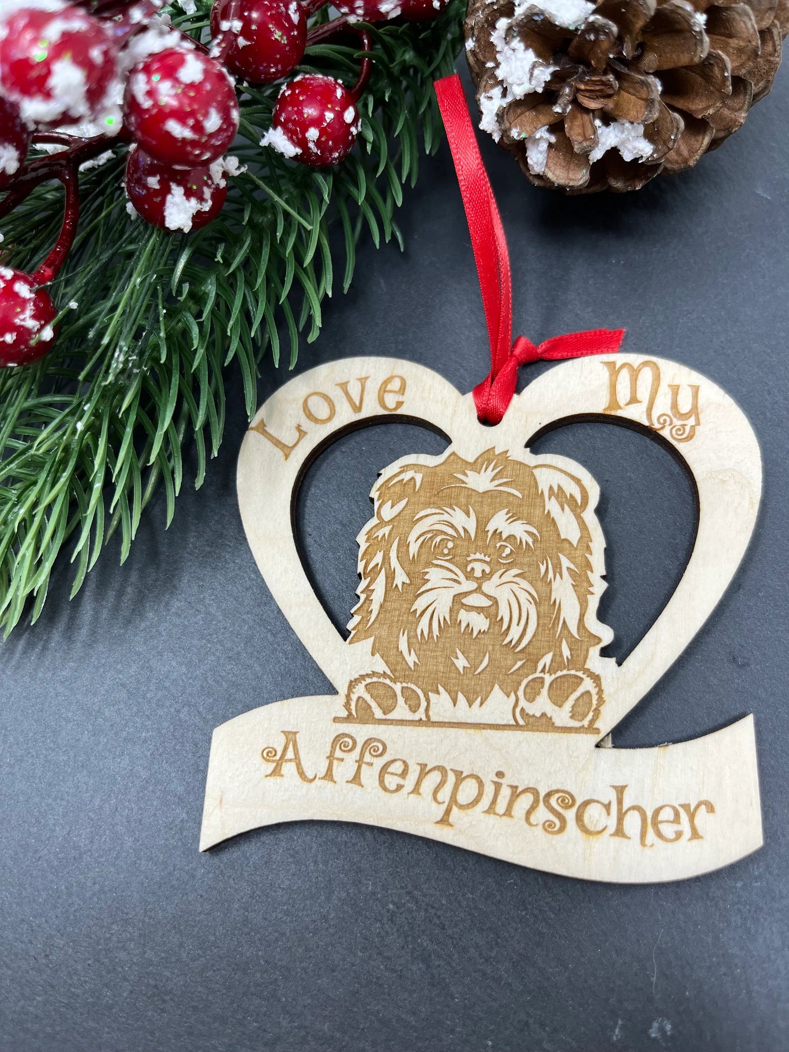 Beautiful laser engraved wooden ornament featuring an Affenpinscher, perfect for Christmas decoration.