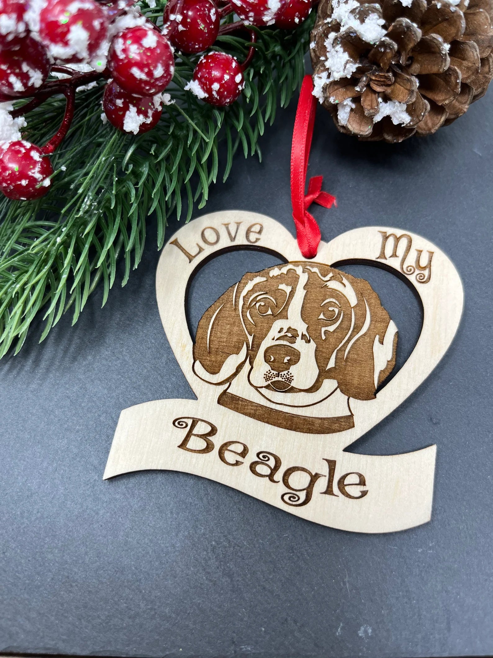 Laser engraved wooden ornament featuring a beagle design, perfect for Christmas decoration.