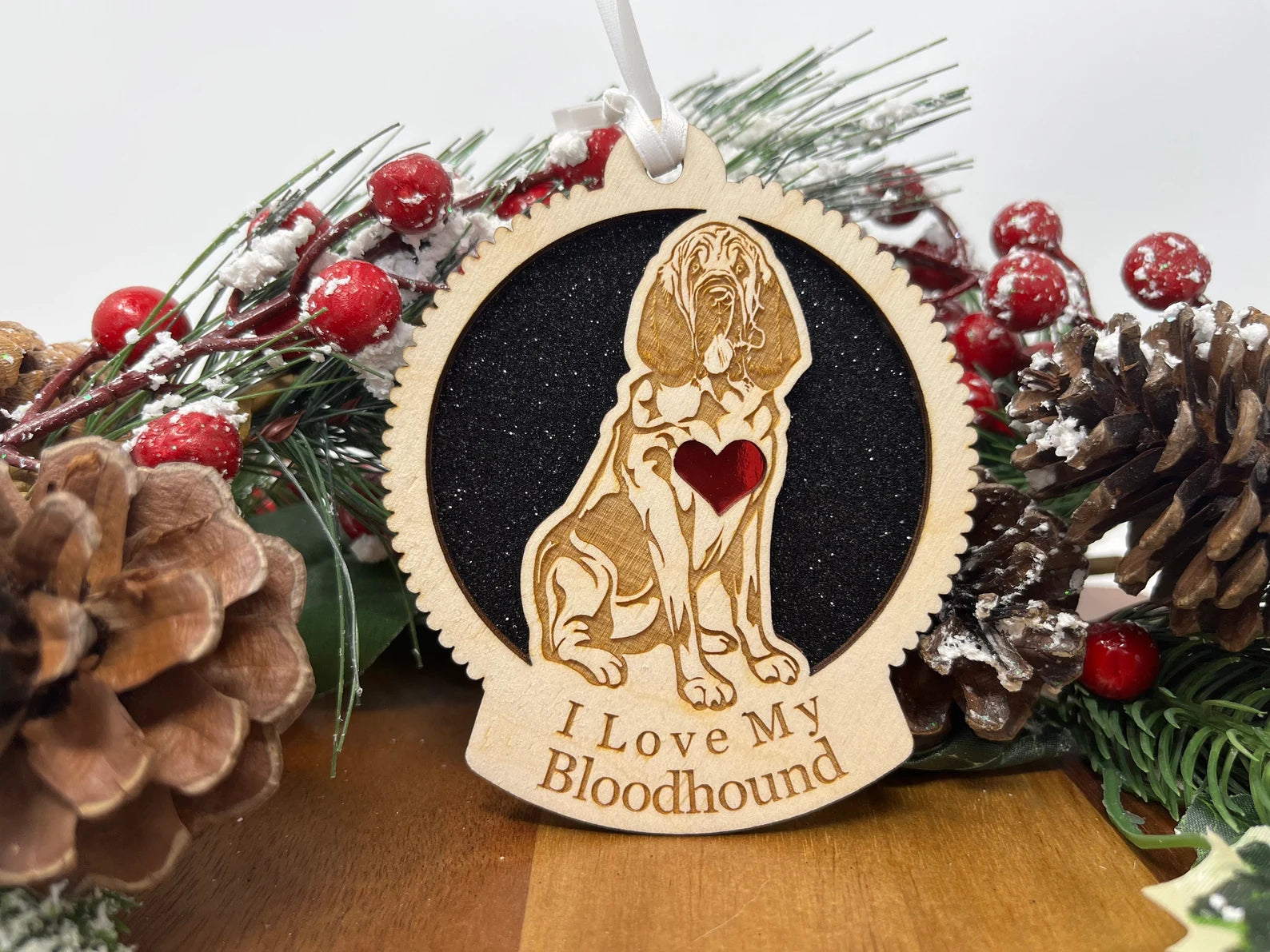 Love My Bloodhound ornament made of laser-cut Baltic Birch wood, featuring a detailed silhouette of a Bloodhound dog, perfect for Christmas decoration.