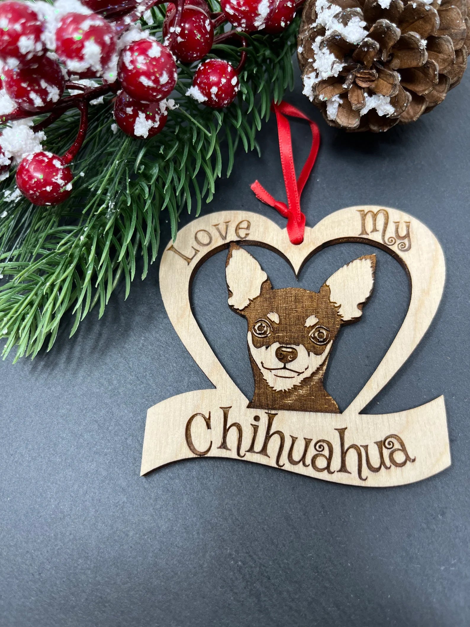 Laser engraved wooden ornament featuring a Chihuahua design, perfect for Christmas decoration.