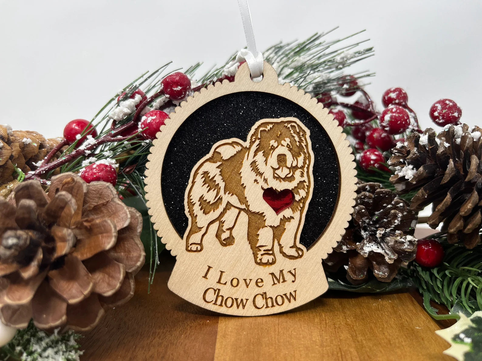 Laser cut wooden ornament featuring a Chow Chow silhouette, perfect for Christmas decoration.