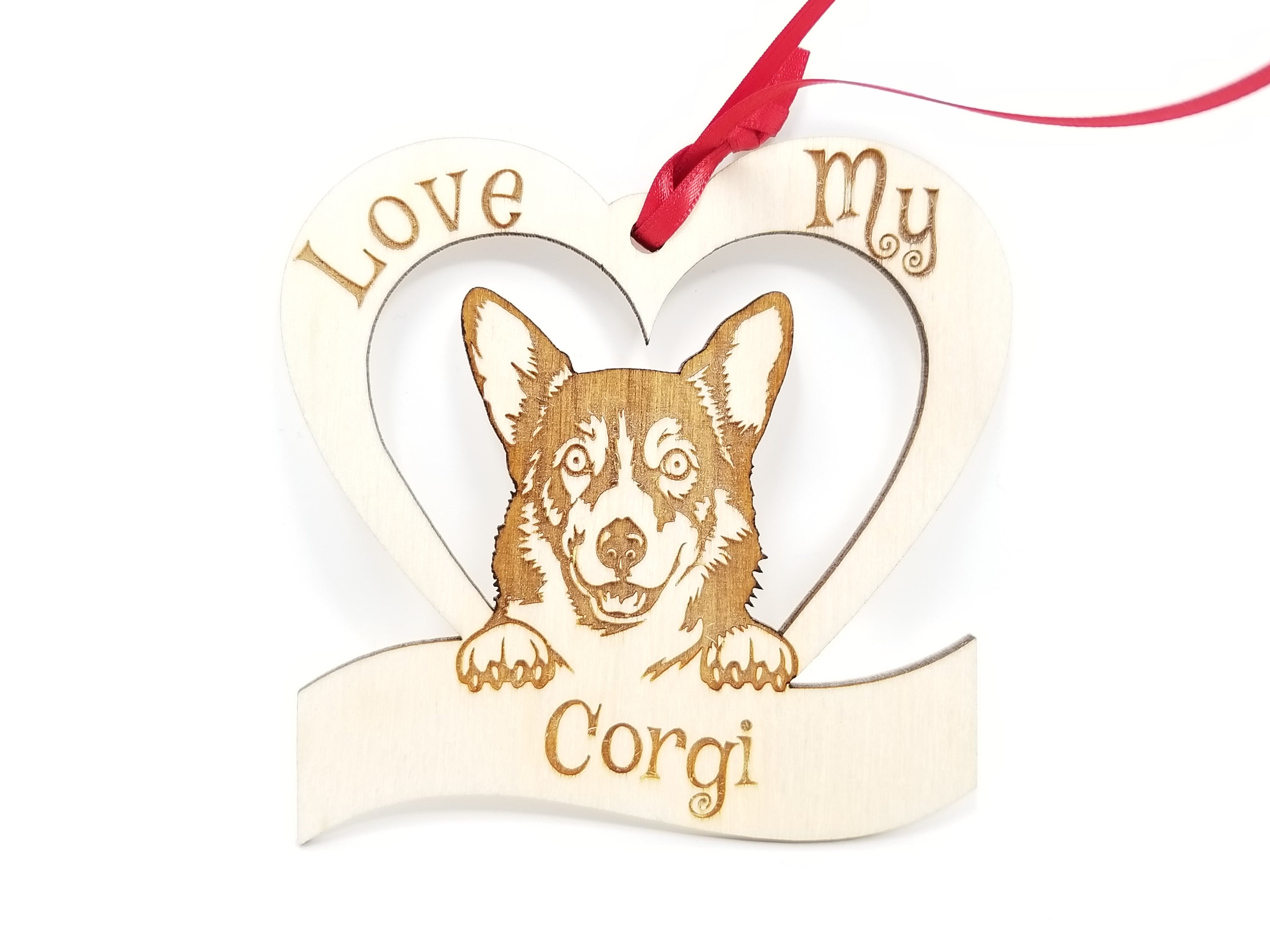 Laser engraved wooden ornament featuring a corgi design, perfect for Christmas decoration.