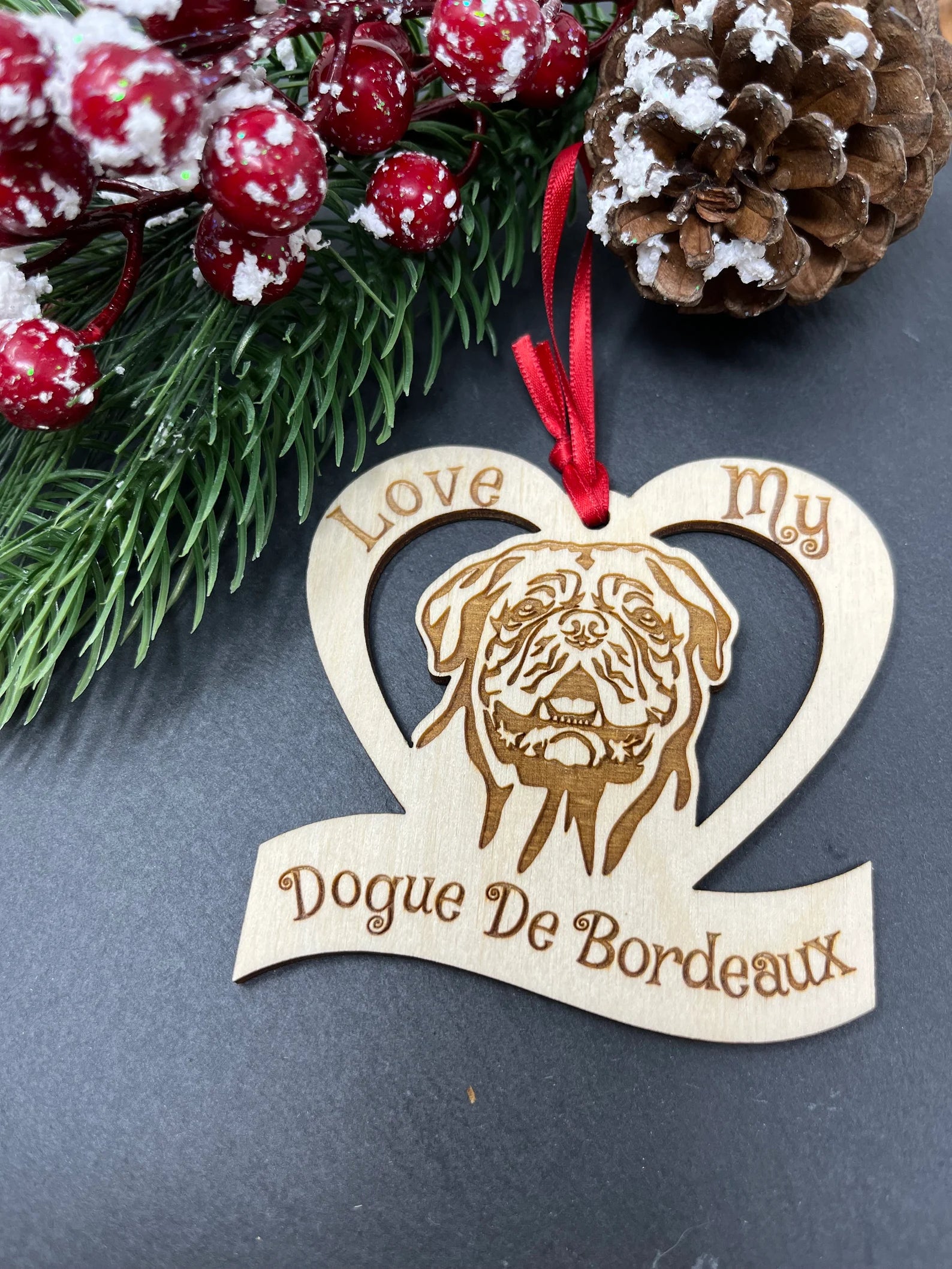 Laser engraved wooden ornament featuring a Dogue De Bordeaux design, perfect for Christmas decoration.